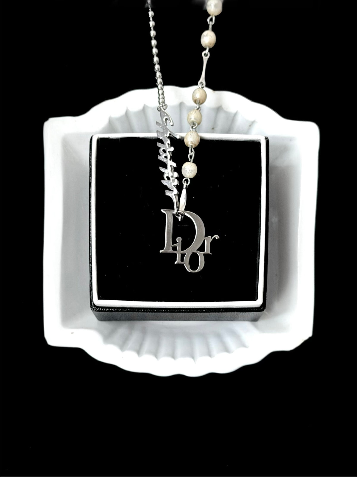 Dior Pearl Logo