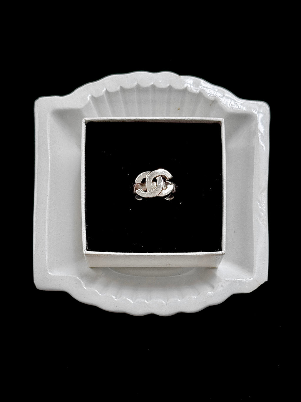 Chanel Silver Emblem
