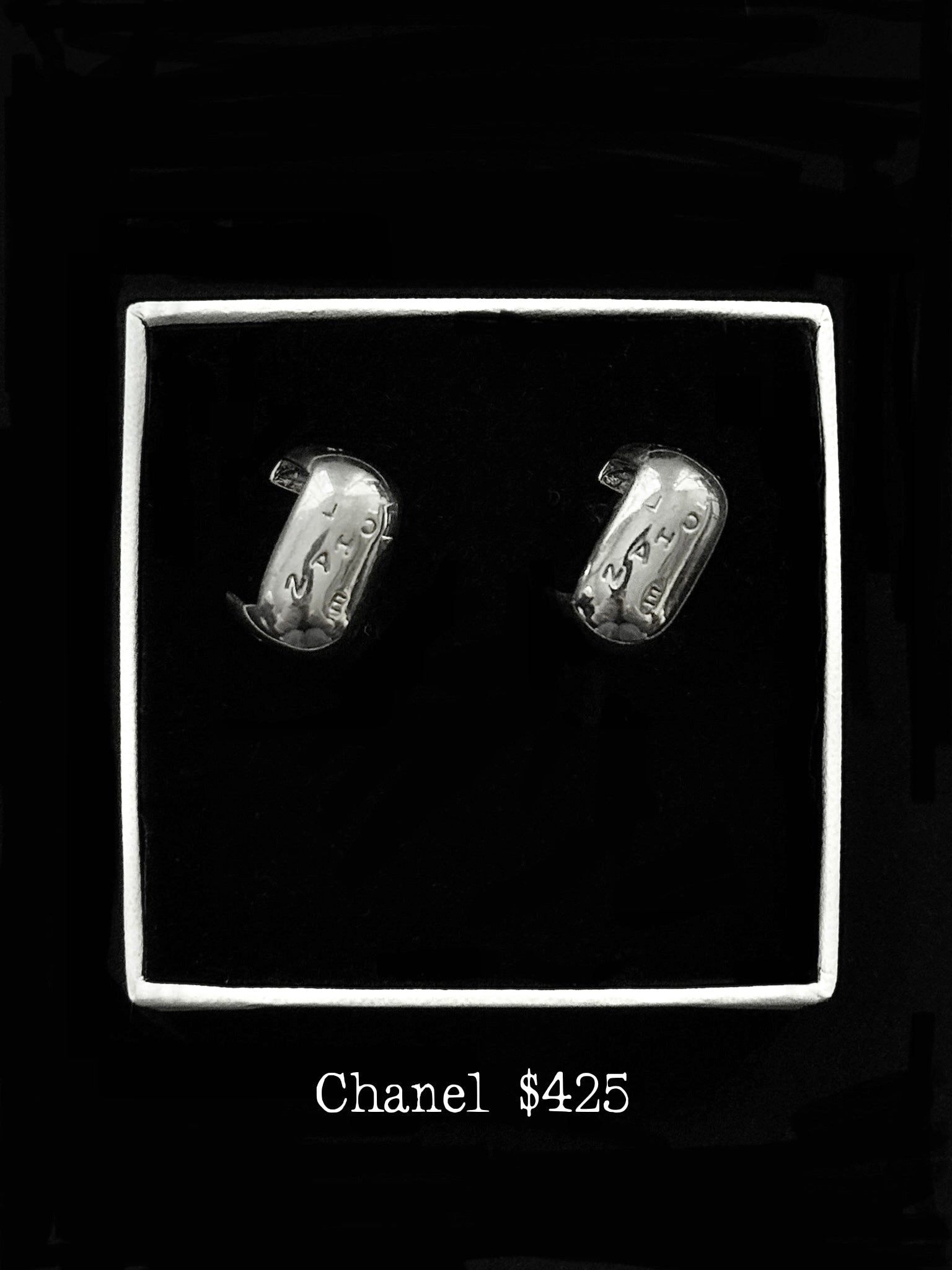 Chanel Silver Curve Chic