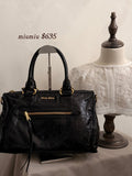MiuMiu Midnight Muse